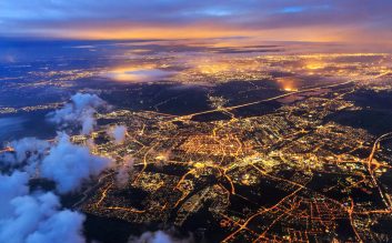 Beautiful aerial cityscape view of the city of Leiden, the Netherlands, after sunset at night in the blue hour